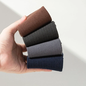 Detail showing 4 pairs of ribbed cotton tabi socks in coffee, grey, and navy blue