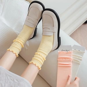 Japanese style ruffle trim crew socks in yellow, pink and white cotton knit fabric