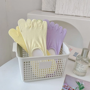 Close-up of pastel cotton five-finger socks in a basket with breathable texture