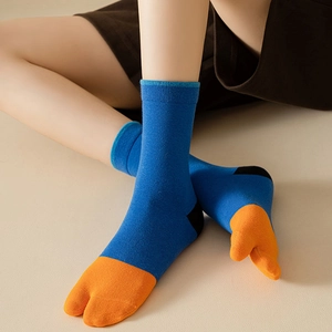 Blue and orange two-toe split socks with reinforced heel in a stylish mid-calf length