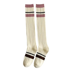 Pink striped knee-high socks in Japanese minimalist style with ribbed cotton texture