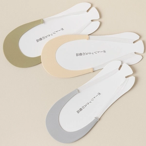 Detailed view of three pairs of thin no-show socks with silicone anti-slip straps