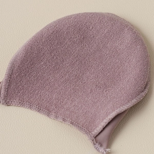 Detailed macro view of purple moisture-absorbent forefoot pad with breathable texture