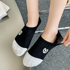 Detail of camellia embroidery socks with breathable mesh and anti-slip silicone heel