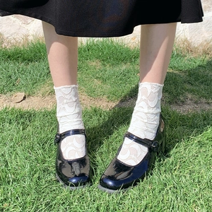 Lolita style white lace mesh calf socks with moon pattern paired with black Mary Jane shoes