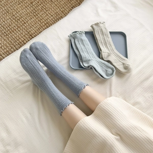 Women's warm wool blend socks with cute ruffle edges and stylish vertical rib texture