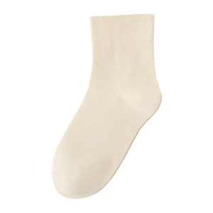 Classic cream knit mid-calf socks with ribbed elastic cuffs on white background