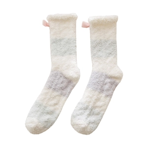 Fuzzy coral fleece mid-calf socks with blue stripes, pink bows and anti-slip grips
