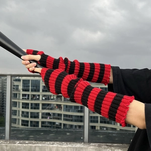 Punk style red and black striped knitted arm warmers with thumb holes for women