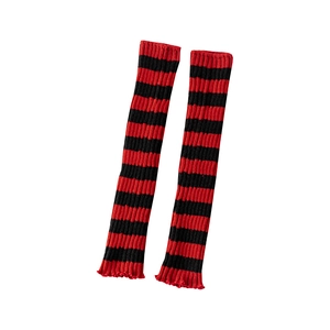 Japanese style red and black striped knit leg warmers with delicate ruffled edges