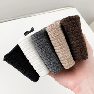 Detailed view of ribbed knit cotton calf socks in black, white, grey and beige colors