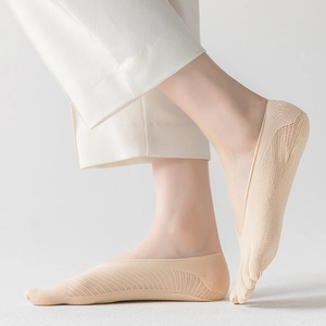 Breathable mesh texture on beige five-finger no-show socks with non-slip silicone