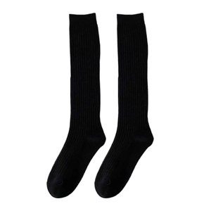Vertical view of black ribbed knee-high cotton socks for women in minimalist JK style