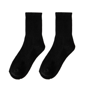 Paire de chaussettes blanches à motifs de lettres avec rayures de sport et semelle bouclée