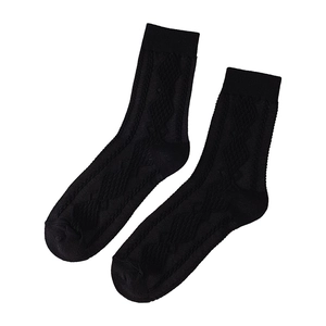 Classic black cotton knit crew socks with diamond patterns and ribbed cuffs for women