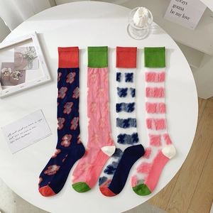 Colorful candy-style JK socks with bear patterns and ribbed cuffs in four vibrant colorways