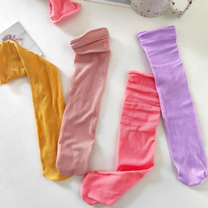 Detail of candy-colored velvet JK socks with breathable ribbed knit texture in four colors