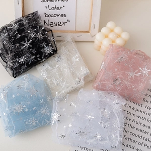 Mesh sheer socks with silver snowflake prints in black, blue, beige, pink, and white