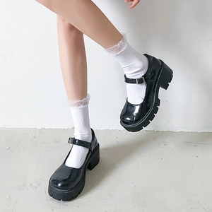 Women's black patent leather Mary Jane shoes with thick heels and platform soles