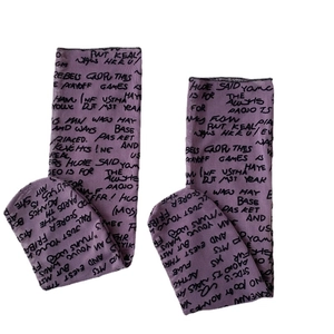 Purple mid-calf socks with black street graffiti lettering and rebel graphics