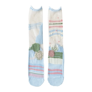 Chaussettes résille vintage bleues à fleurs avec bords roulés et pois en relief