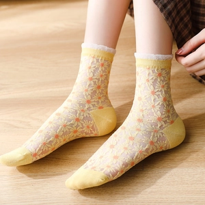 Chaussettes en résille jaune avec broderie marguerite et bordure en dentelle femme