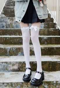 White JK uniform over-knee stockings with silk bows and black Mary Jane shoes