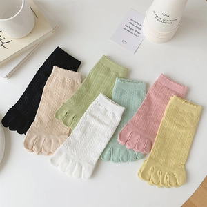 Detail of multi-color five-toe socks with diamond knit texture in macaron tones
