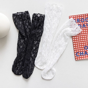 Japanese style lace crew socks in black and white with vintage floral patterns