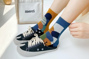 Detail of colorful geometric pattern cotton split toe tabi socks with ribbed cuff