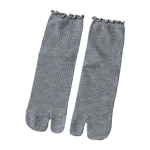 Gray Tabi socks with ribbed knit pattern and delicate lettuce edge cuffs on white background