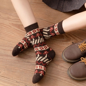 Thick wool socks for women with vintage floral pattern worn with leather shoes