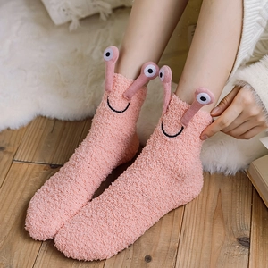 Warm pink coral fleece socks with cute cartoon 3D eyes for cozy indoor home wear
