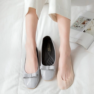 Elegant grey square-toe patent leather ballet flats with bow and no-show socks