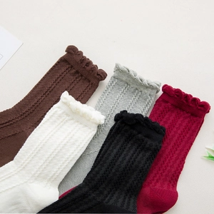 Five pairs of vintage rib-knit mid-calf cotton socks with delicate ruffle trim for women