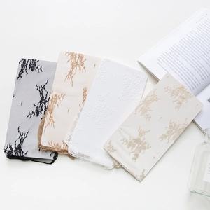 Lace crew socks with floral embroidery in black, beige, white, and nude colors