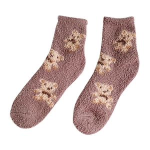 Winter fuzzy coral fleece socks for women featuring cute cartoon bear pattern design