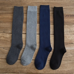 Set of four cotton knee-high socks in grey, navy, and black with ribbed elastic cuffs