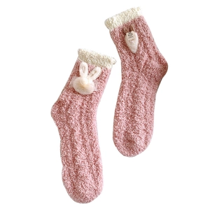 Cozy pink coral fleece thermal socks with cute 3D plush rabbit for winter warmth