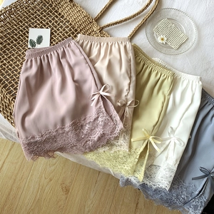 Close-up of lace-trimmed ice silk safety shorts in multiple soft pastel color variants