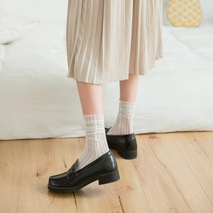 White semi-transparent mesh crew socks with ruffled edges and vertical striped texture