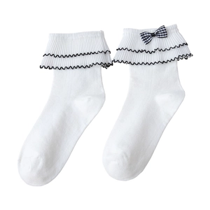 White Lolita socks with double ruffled lace trim and black gingham bow accents