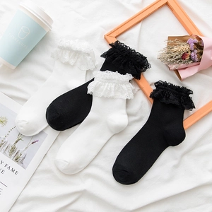 Detailed view of Lolita style crew socks featuring elegant double-layered lace ruffles