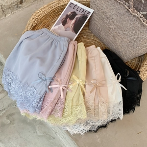 Detailed display of assorted ice silk safety shorts with lace trim and ribbon bows