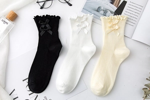 Three-pack mid-calf cotton socks with lace trim and double bows in black, white and beige