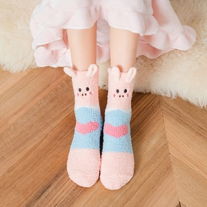 Cute pink and blue coral fleece crew socks with cartoon pig ears and heart patterns