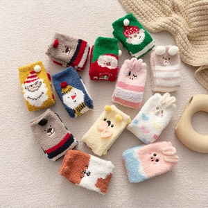 Cozy Christmas coral fleece socks set with cute 3D animal and festive holiday patterns