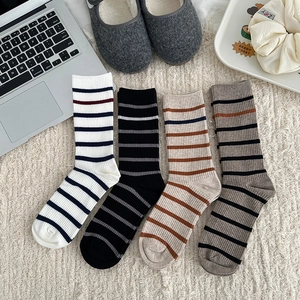 Set of four striped cotton mid-calf socks in black, white, beige, and grey colors
