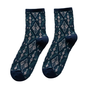 Vintage argyle mid-calf socks for women featuring navy blue and green jacquard pattern