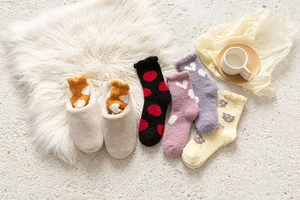 Winter coral fleece thermal socks set featuring cute heart and dot patterns for home wear